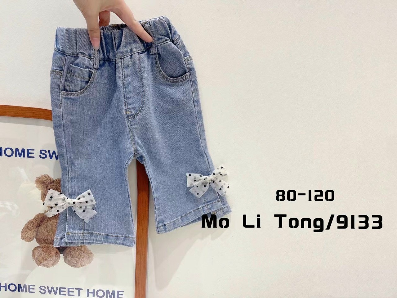 SA - Quần Jean xanh BG ống loe nơ